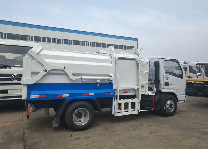東風(fēng)5方側(cè)裝壓縮式對接垃圾車-5方側(cè)裝壓縮式對接垃圾車